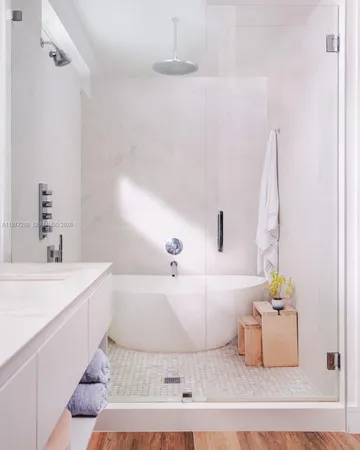 a bathroom with a bathtub and a sink