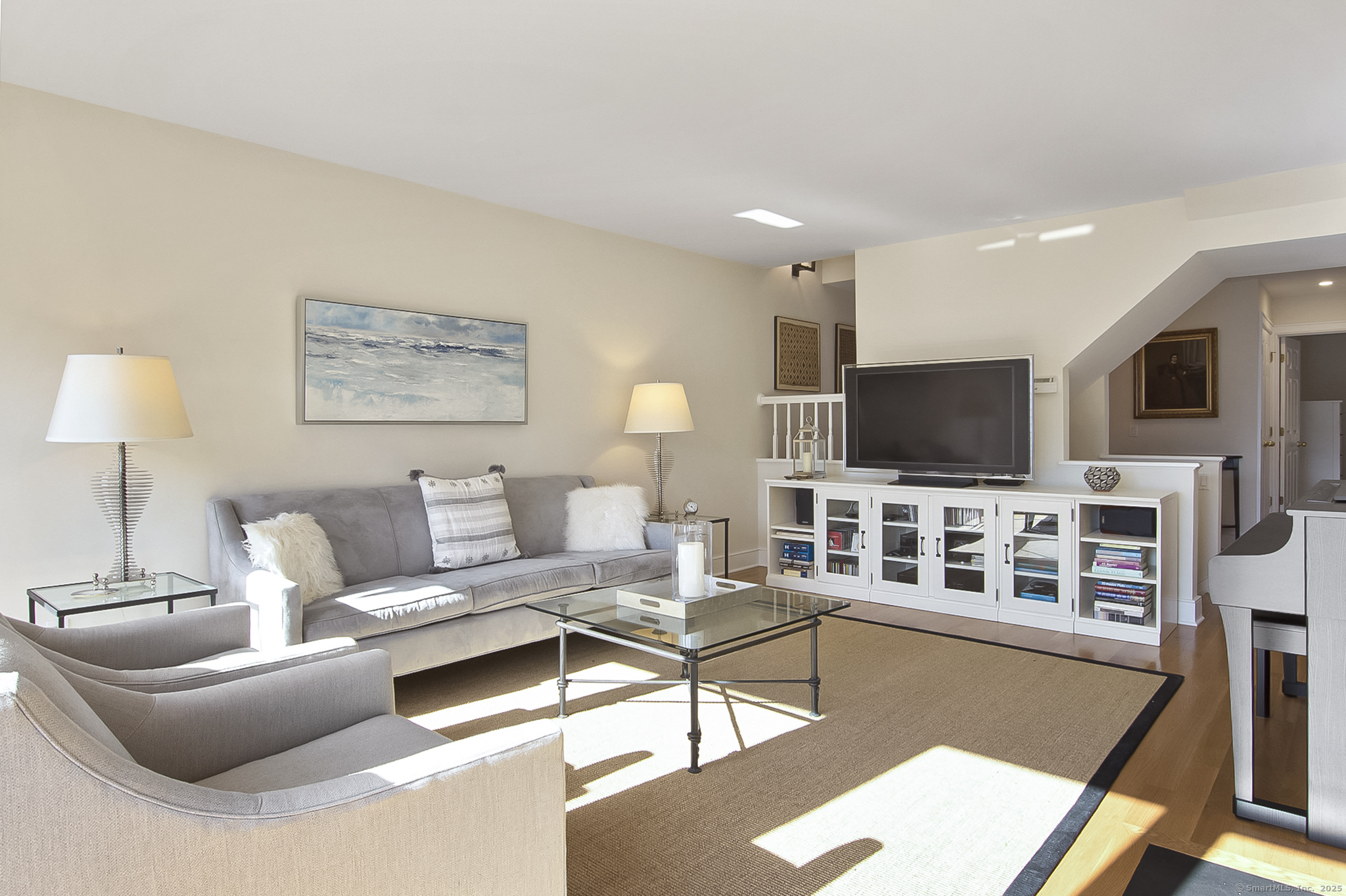 20 Wilton Crest, Unit 20 Wilton, CT 06897 - Photo 13 of 40 a living room with furniture and a flat screen tv