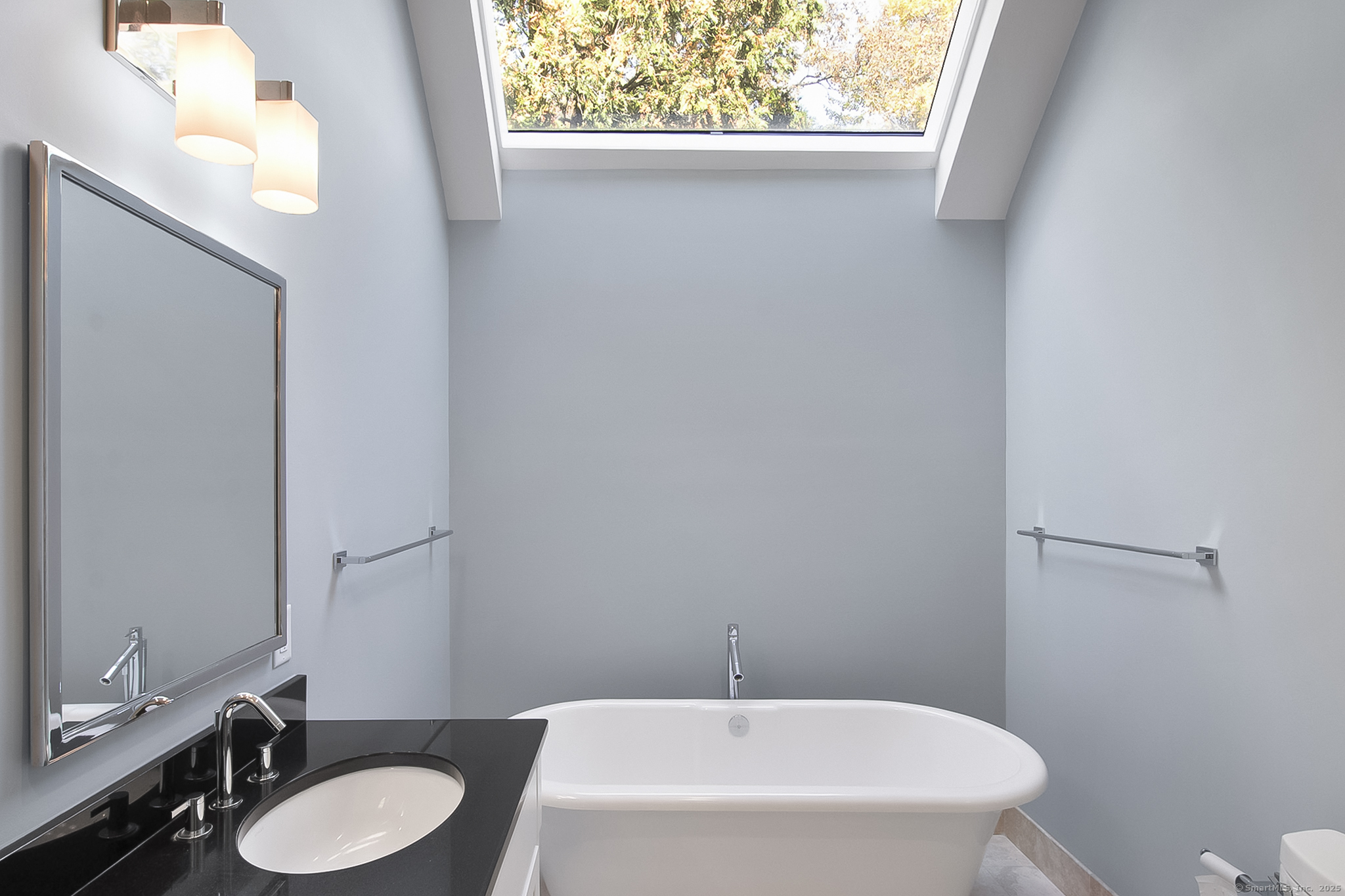 20 Wilton Crest, Unit 20 Wilton, CT 06897 - Photo 18 of 40 a bathroom with a sink and a toilet