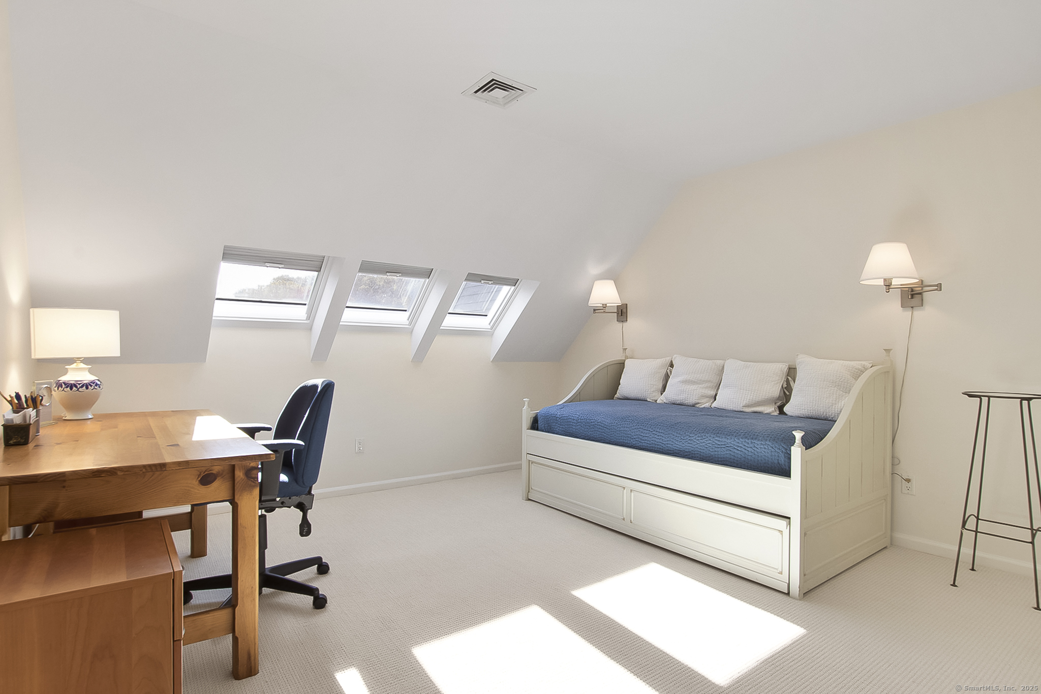 20 Wilton Crest, Unit 20 Wilton, CT 06897 - Photo 24 of 40 a living room with furniture and a table
