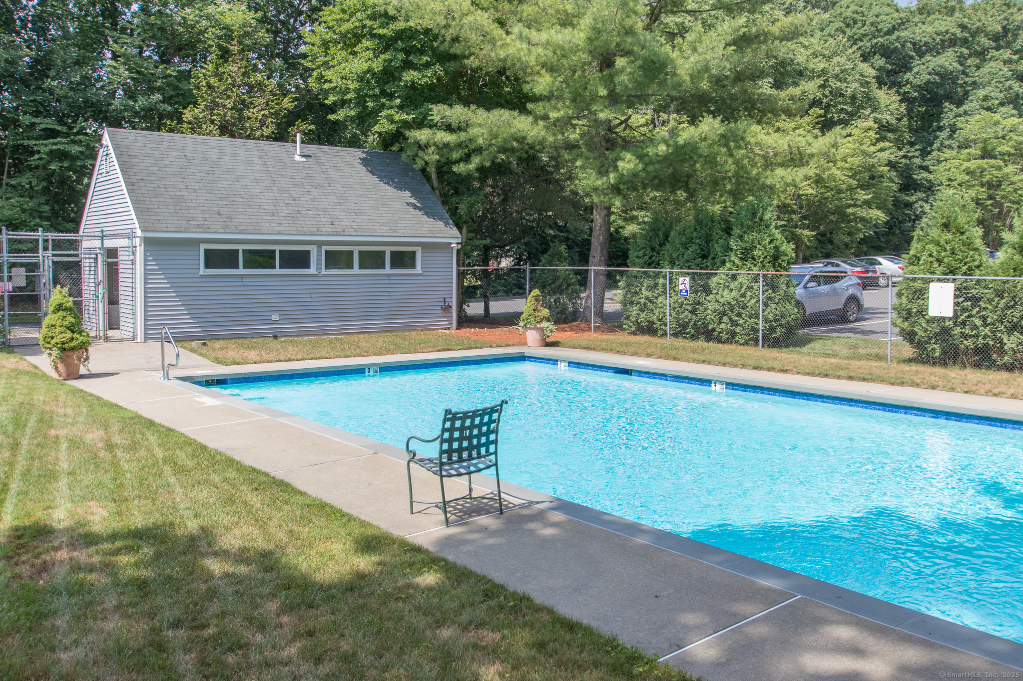 20 Wilton Crest, Unit 20 Wilton, CT 06897 - Photo 34 of 40 a view of a house with pool and a yard