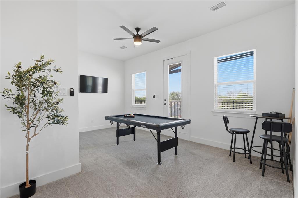 3316 Nomas Street Dallas, TX 75212 - Photo 16 of 27 a view of a livingroom with furniture and a potted plant