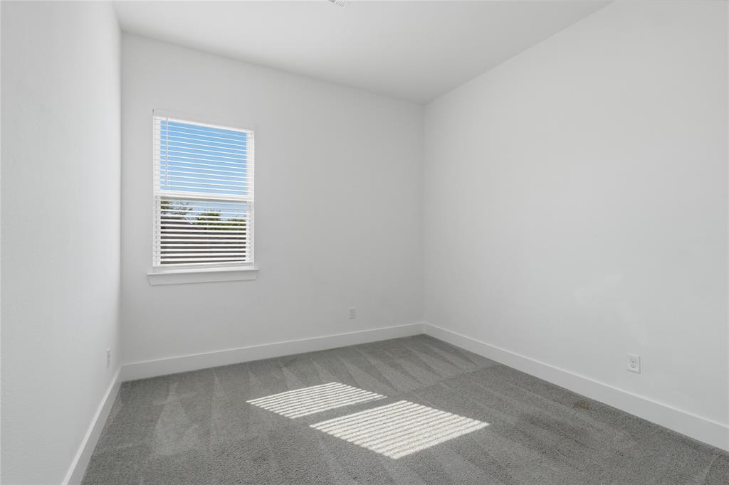 3316 Nomas Street Dallas, TX 75212 - Photo 20 of 27 an empty room with a window