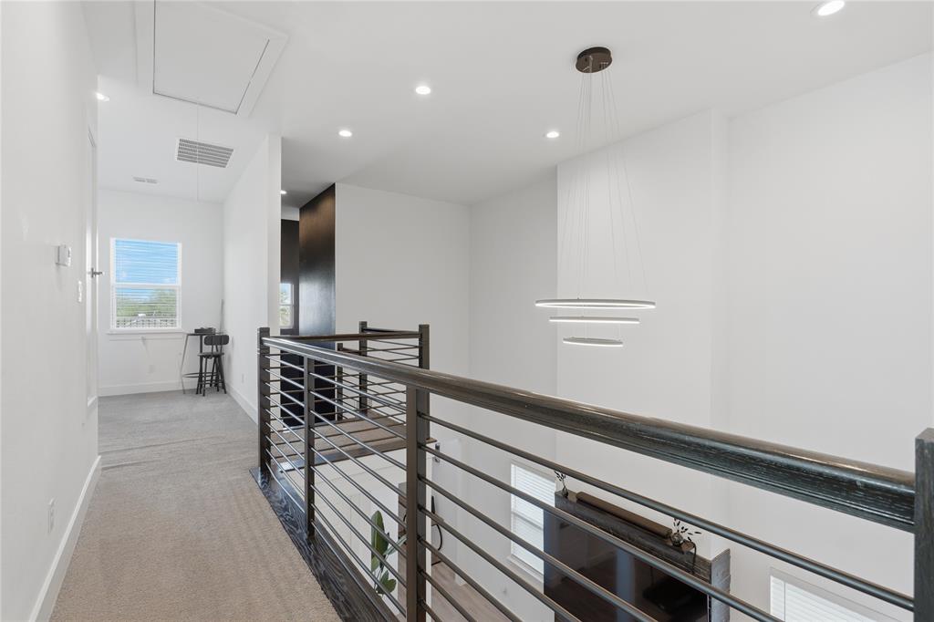3316 Nomas Street Dallas, TX 75212 - Photo 23 of 27 a view of a hallway with workspace