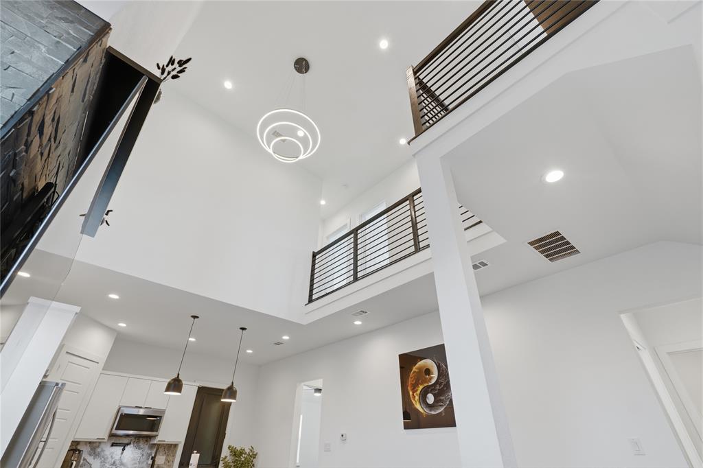 3316 Nomas Street Dallas, TX 75212 - Photo 7 of 27 a view of a hallway with windows