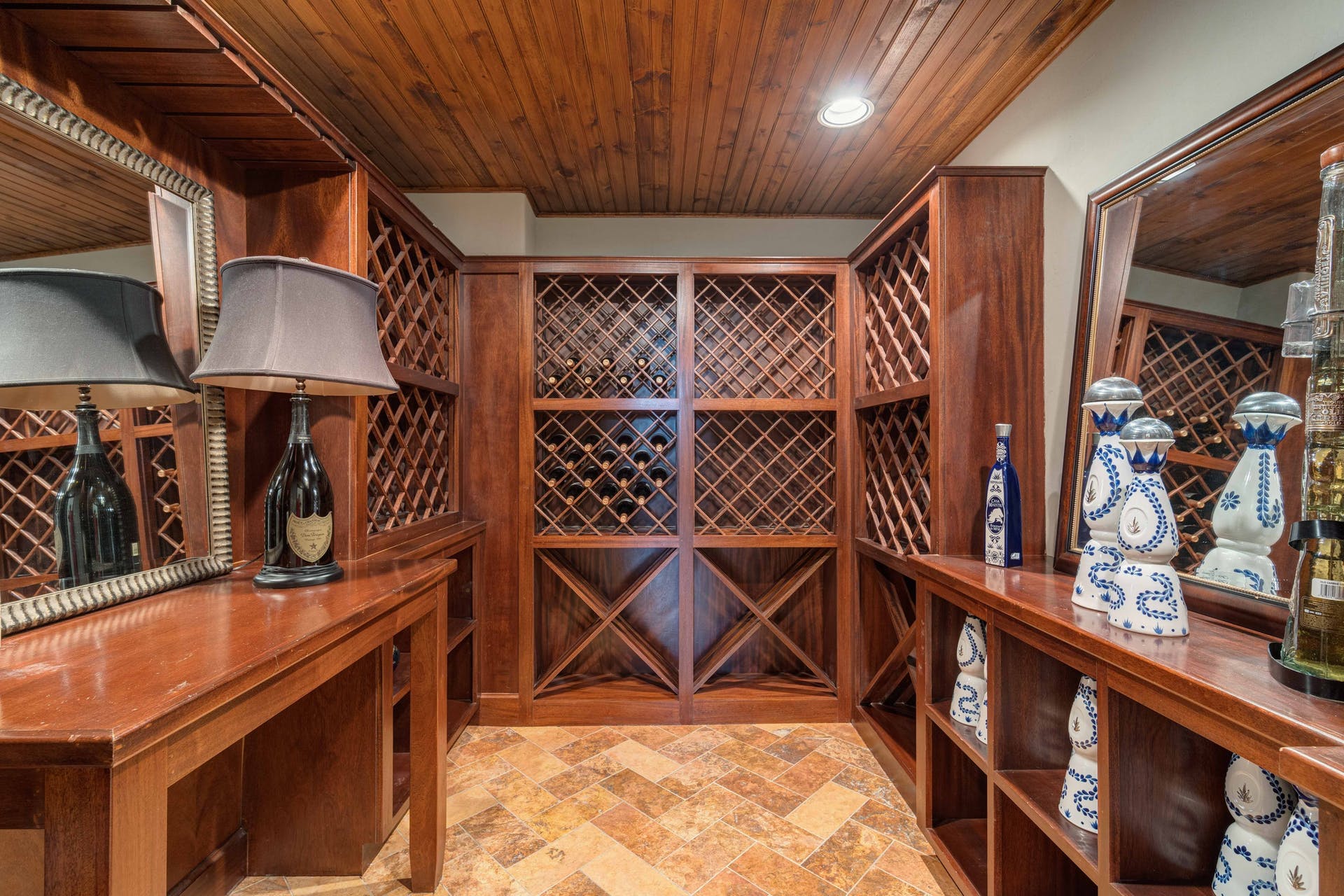 9104 Atwater Cove Austin, TX 78733 - Photo 14 of 36 Wine area with wooden ceiling and stone finish floors