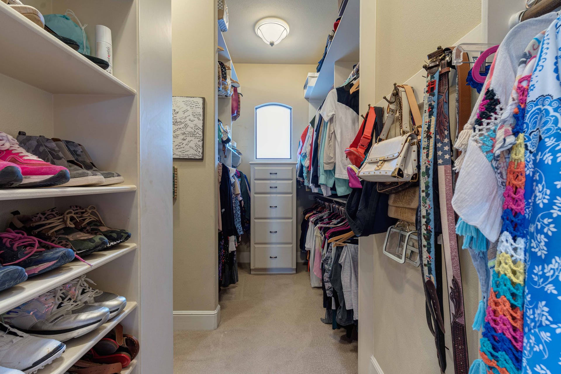 9104 Atwater Cove Austin, TX 78733 - Photo 19 of 36 Spacious closet with light carpet
