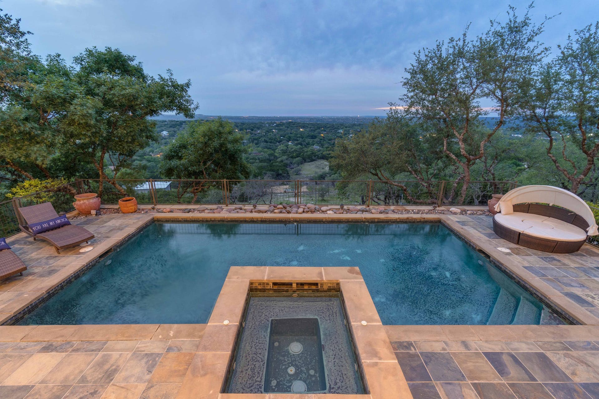 9104 Atwater Cove Austin, TX 78733 - Photo 32 of 36 View of swimming pool with a patio and a pool with connected hot tub