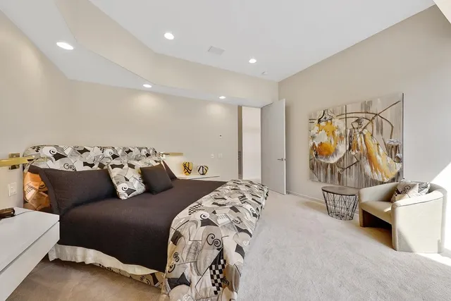 a bathroom with a sink double vanity and a mirror