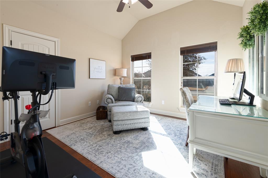 266 Weatherby Street Tuscola, TX 79562 - Photo 20 of 29 Home office with light wood-style floors and a ceiling fan