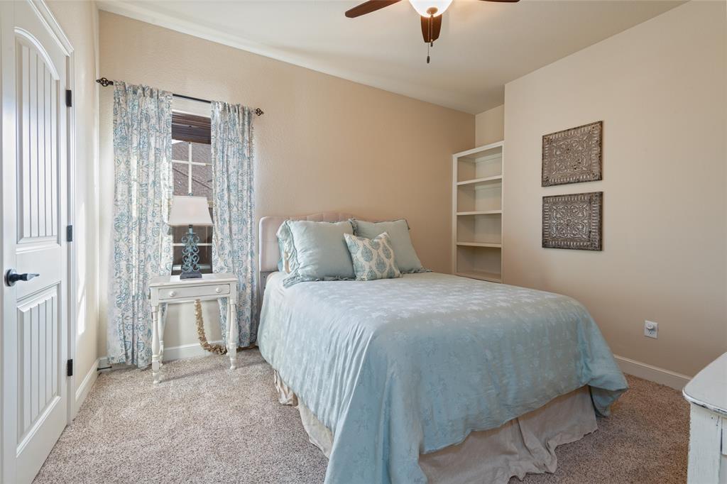 266 Weatherby Street Tuscola, TX 79562 - Photo 24 of 29 Carpeted bedroom with a ceiling fan and baseboards