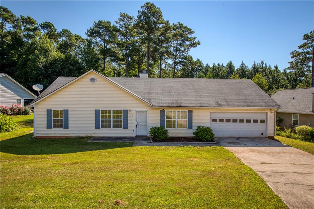 4800 Pauline Road Douglasville, GA 30135 - Photo 1 of 1 a house view with a garden space