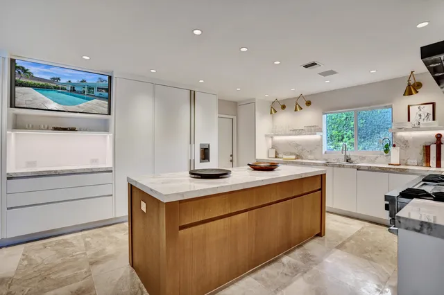 a close view of a sink and a faucet in a kitchen