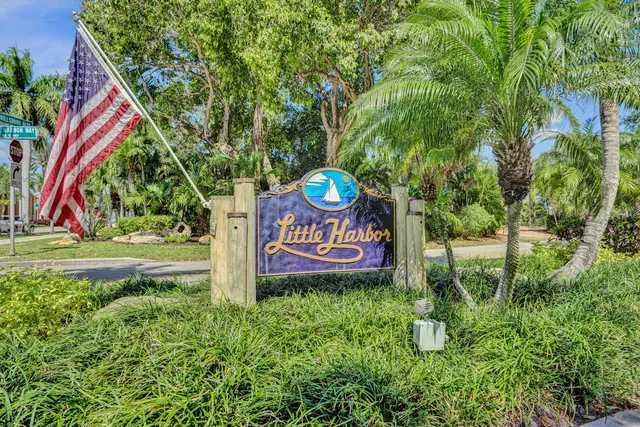 an aerial view of a house with a lake view