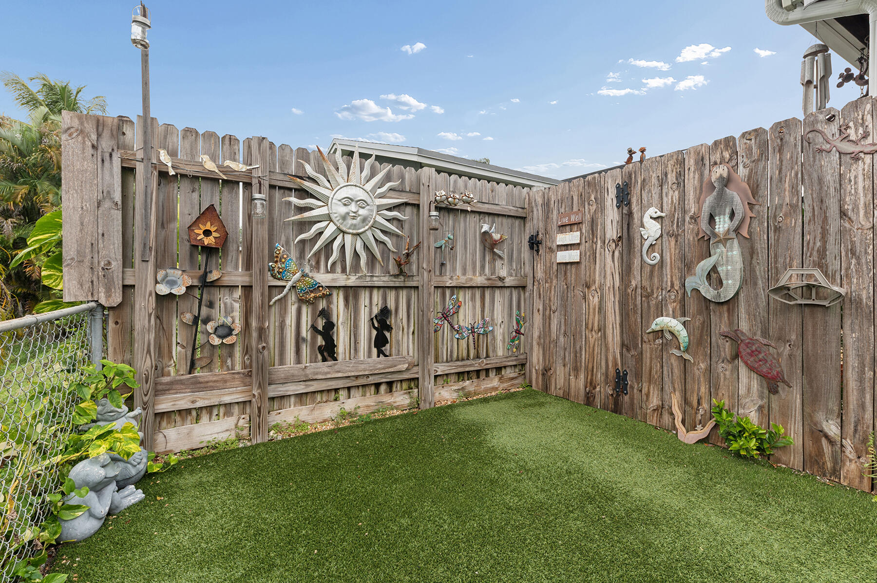 9220 Southwest 2nd Street Boca Raton, FL 33428 - Photo 15 of 16 a view of entryway with a garden