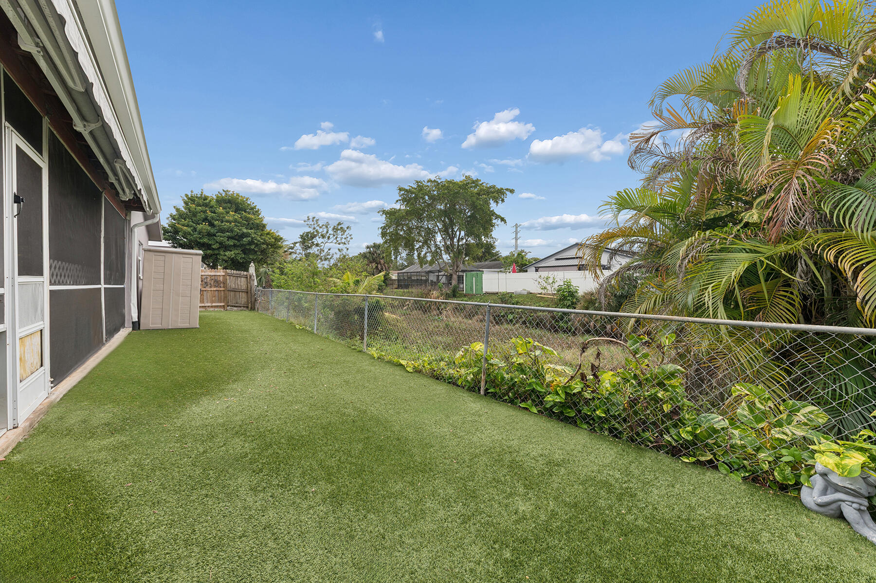 9220 Southwest 2nd Street Boca Raton, FL 33428 - Photo 16 of 16 a view of a yard with a fountain