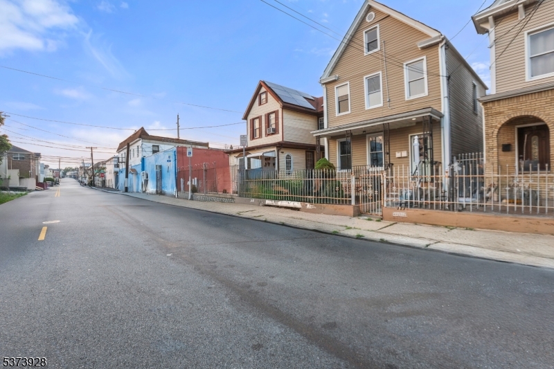 79 Irving Street Newark, NJ 07104 - Photo 3 of 30 a view of a building with a street