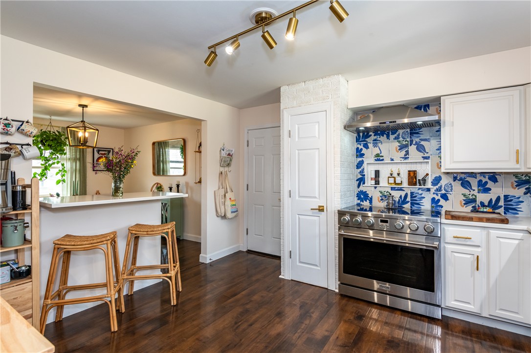 4102 Ridgetop Drive Bellbrook, OH 45305 - Photo 7 of 33 This inviting kitchen boasts a bright design and modern appliances, perfect for everyday living.