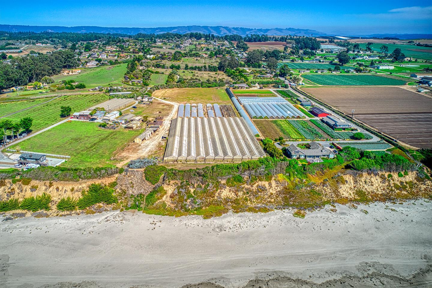 21 Lilly Way Watsonville, CA 95076 - Photo 3 of 47 an aerial view of a house with a yard and lake view