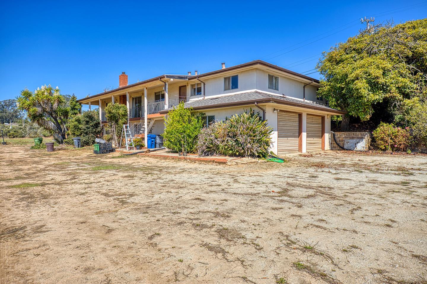 21 Lilly Way Watsonville, CA 95076 - Photo 6 of 47 a front view of a house with a yard