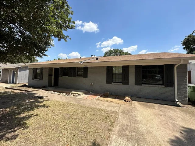 a front view of a house having yard