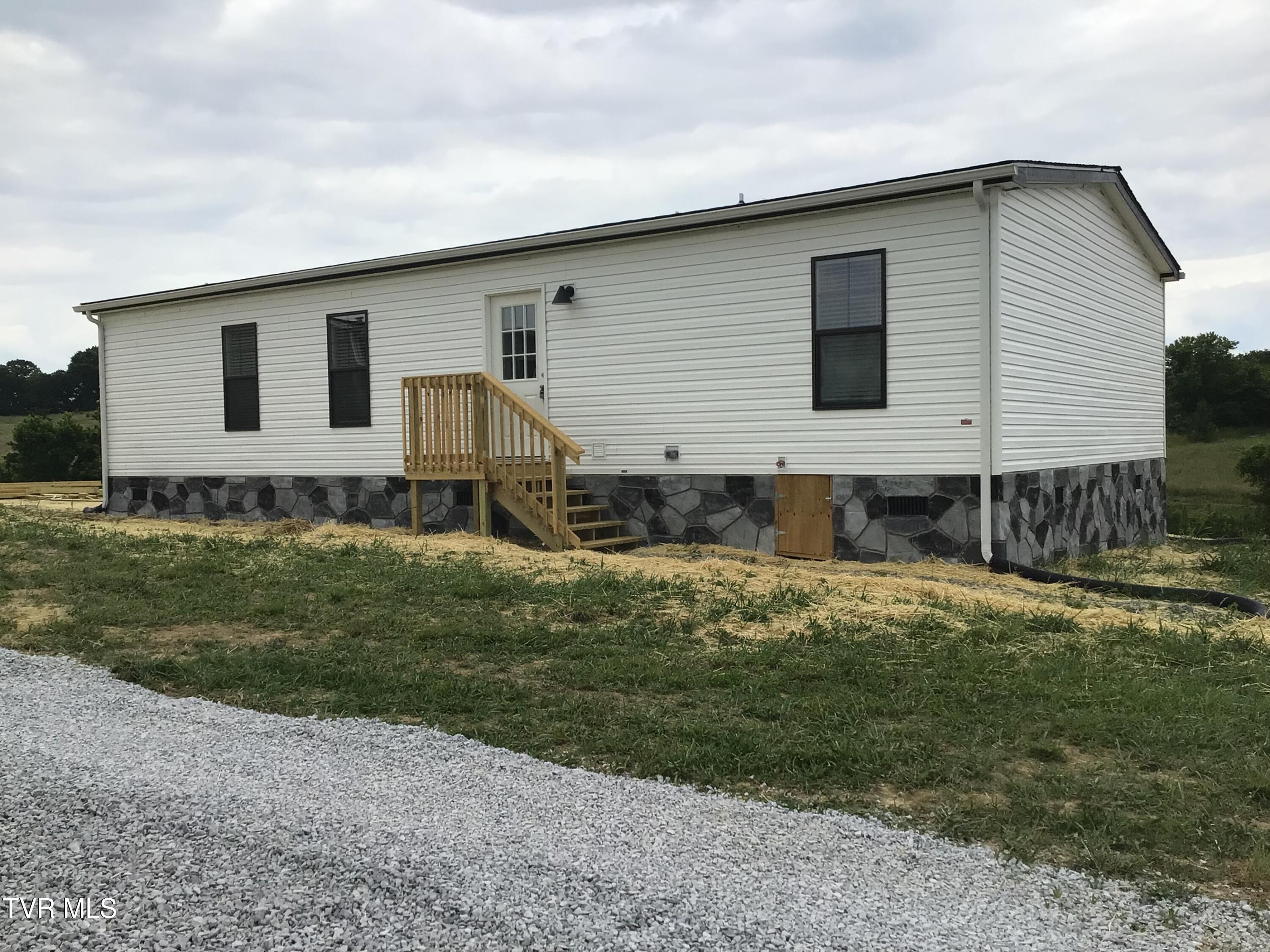 825 Dulaney Road Mosheim, TN 37818 - Photo 4 of 30 825 Dulaney Rd