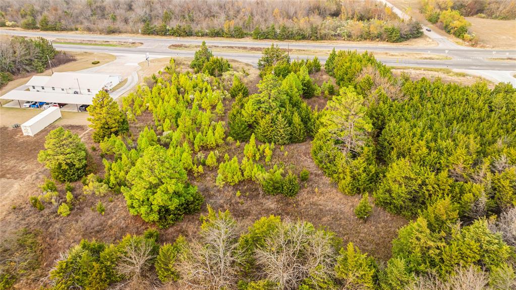 725 Southwest Loop 286 Paris, TX 75460 - Photo 11 of 21 a view of a lake with an outdoor space