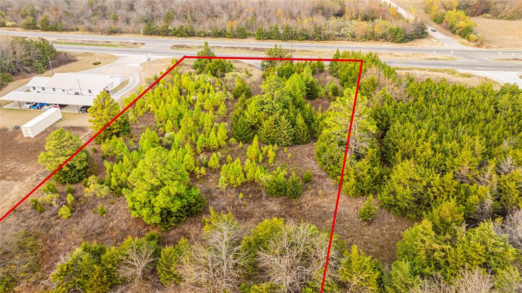 725 Southwest Loop 286 Paris, TX 75460 - Photo 12 of 21 a view of an outdoor space and a lake view