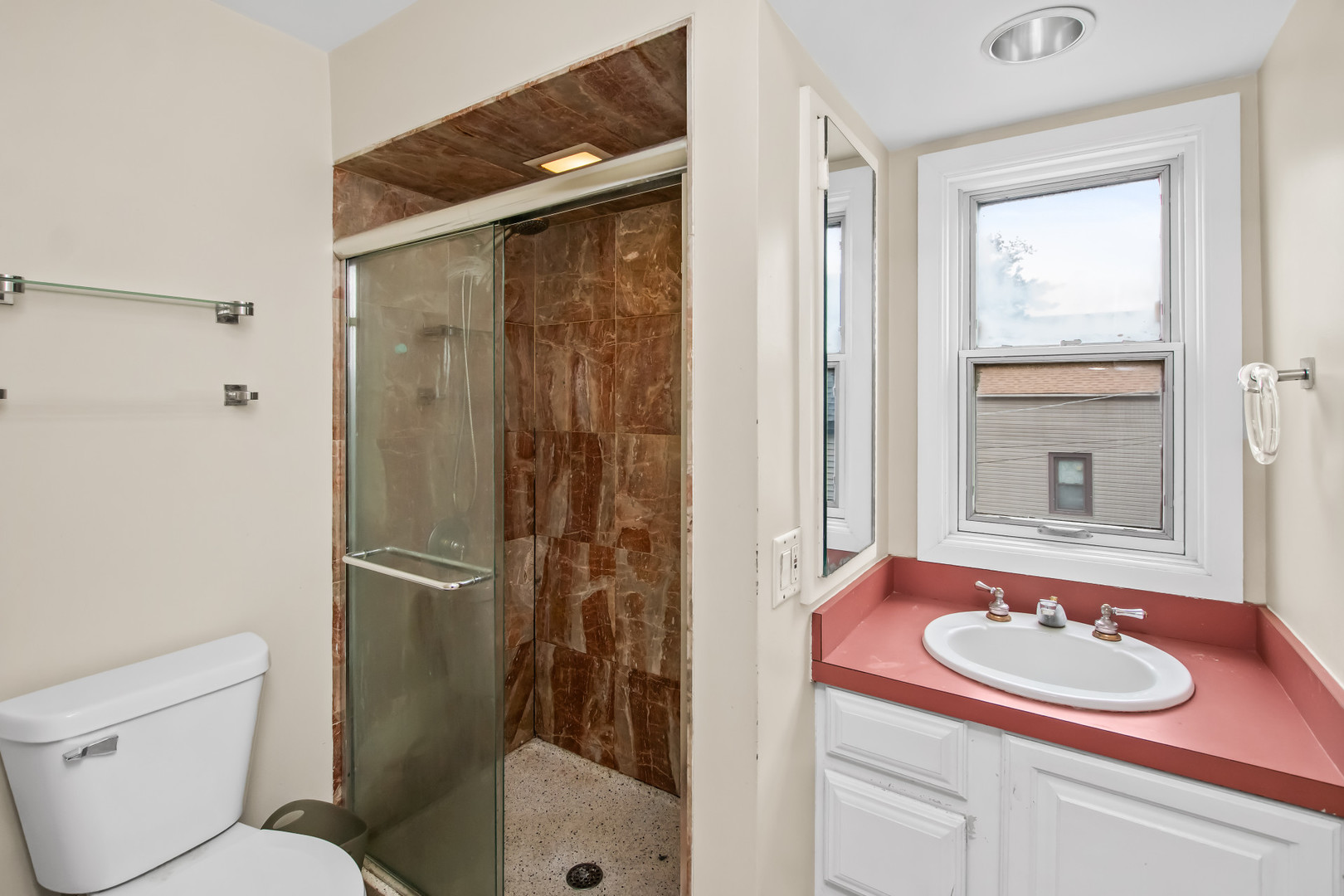 2238 West 21st Place Chicago, IL 60608 - Photo 12 of 37 a bathroom with a sink and a mirror