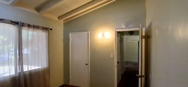 a view of a bathroom with a glass door