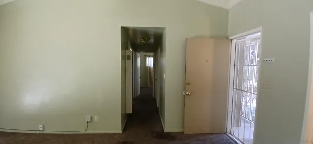 a bathroom with a mirror a sink and a toilet