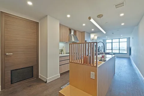 a bedroom with a bed and a walk in closet