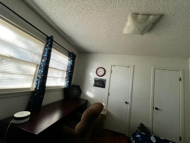 a room with furniture and window