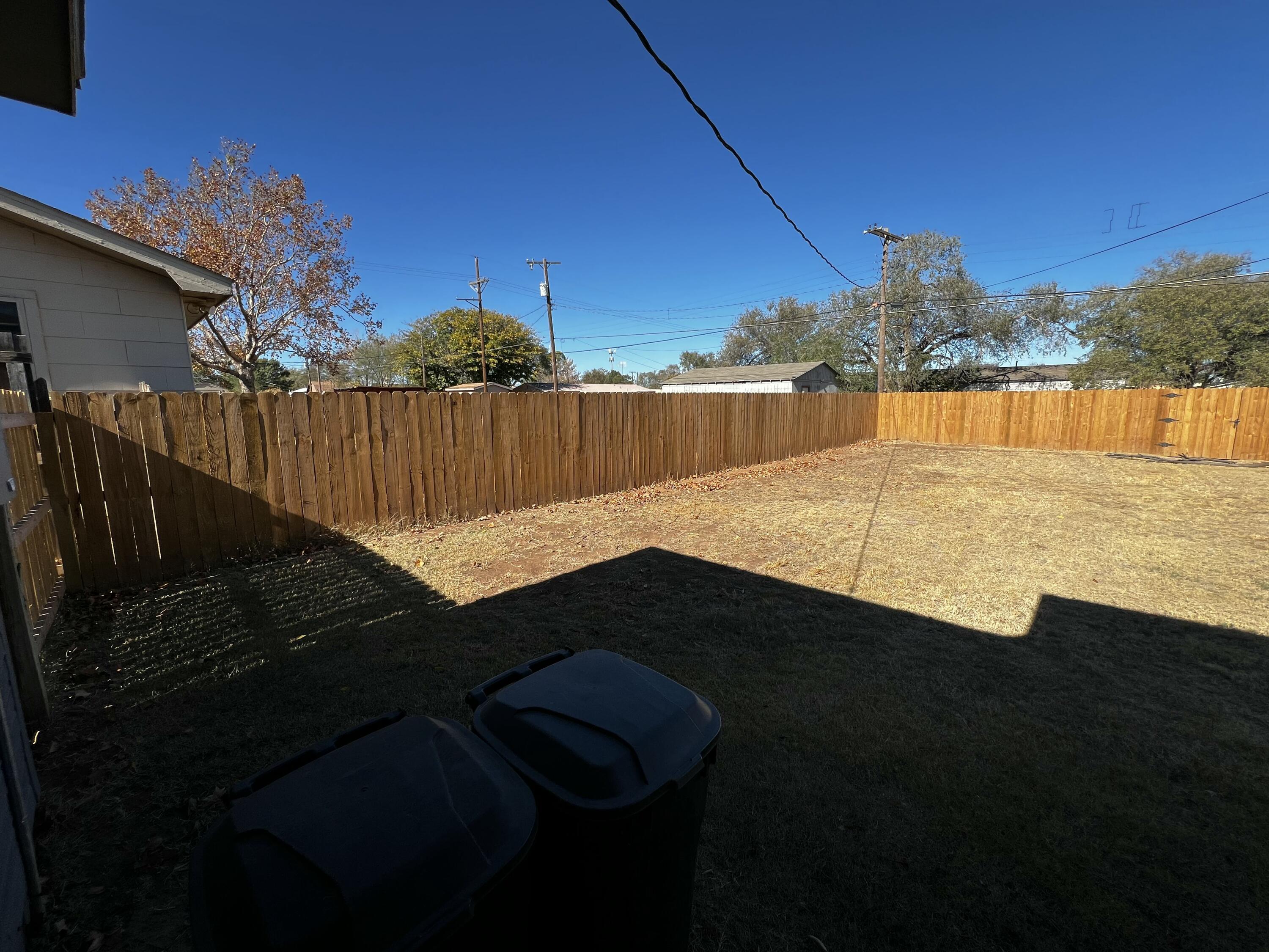 4520 36th Street Lubbock, TX 79414 - Photo 30 of 30 a view of swimming pool outdoor space and lake view in back