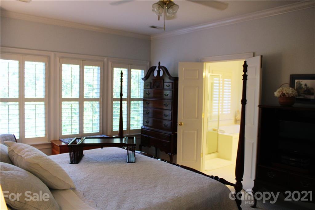 3022 Colonel Springs Way, Unit 171 Fort Mill, SC 29708 - Photo 14 of 30 a living room with furniture and a flat screen tv