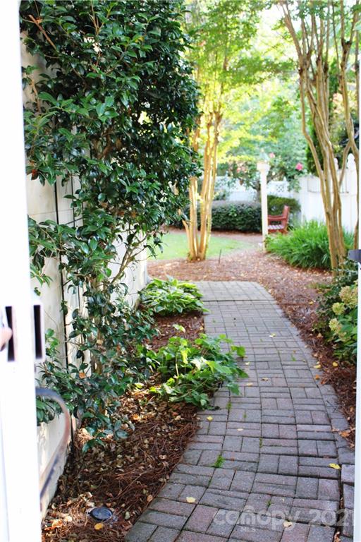 3022 Colonel Springs Way, Unit 171 Fort Mill, SC 29708 - Photo 16 of 30 a view of a garden with pathway