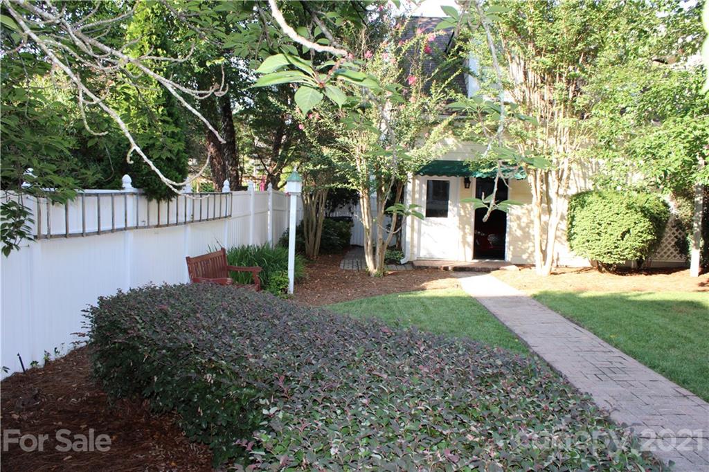3022 Colonel Springs Way, Unit 171 Fort Mill, SC 29708 - Photo 21 of 30 a front view of a house with garden