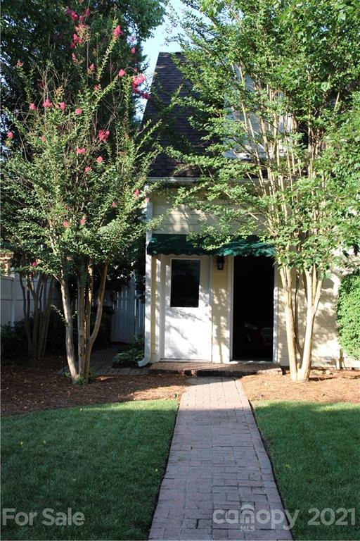 3022 Colonel Springs Way, Unit 171 Fort Mill, SC 29708 - Photo 22 of 30 a front view of a house with a yard and a garage