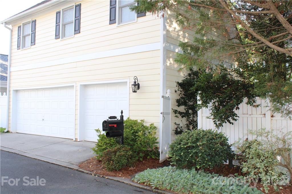 3022 Colonel Springs Way, Unit 171 Fort Mill, SC 29708 - Photo 23 of 30 a front view of a house with garden