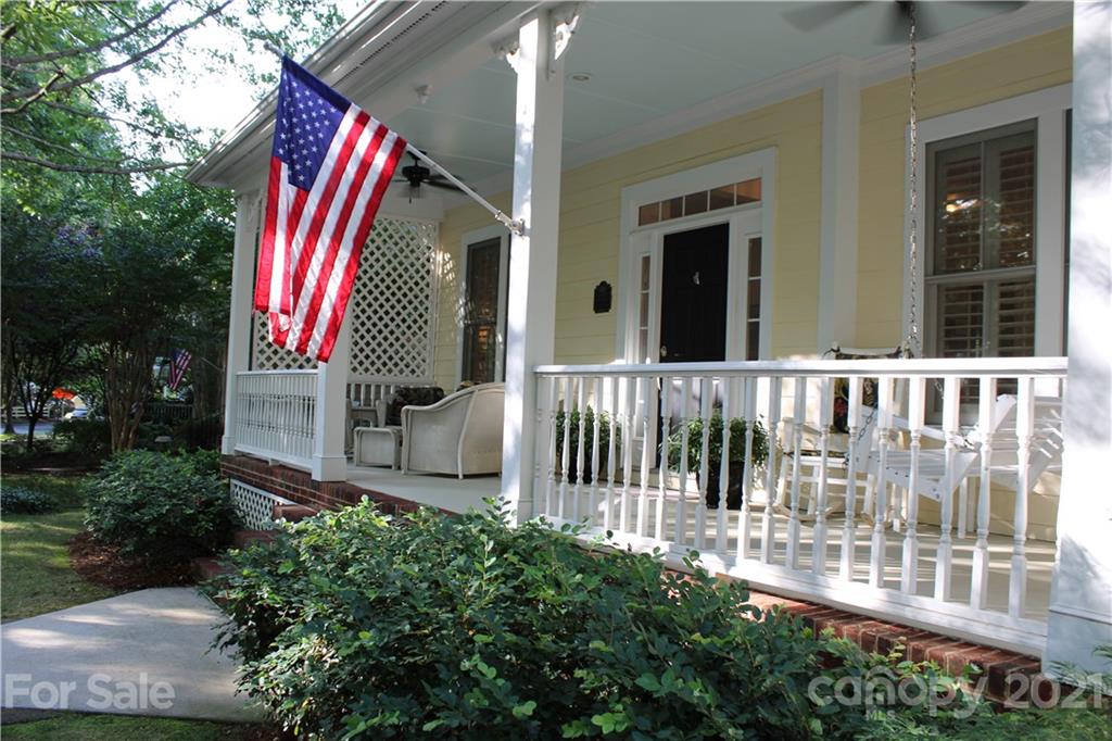 3022 Colonel Springs Way, Unit 171 Fort Mill, SC 29708 - Photo 4 of 30 a view of a house with a small yard and wooden fence