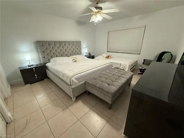 a view of storage and utility room with washer and dryer