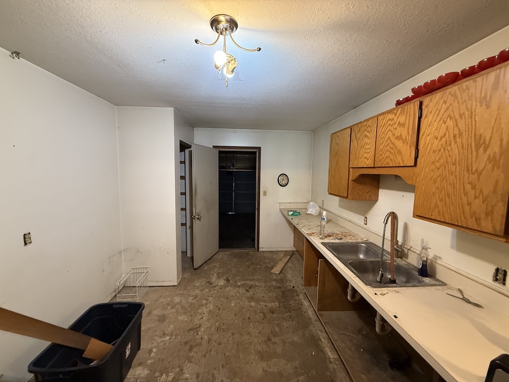 109 Ravinia Drive Shorewood, IL 60404 - Photo 6 of 14 a kitchen with a sink appliances and cabinets