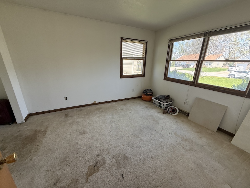 109 Ravinia Drive Shorewood, IL 60404 - Photo 9 of 14 an empty room with a window