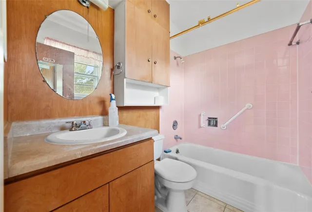 a bathroom with a shower and a toilet