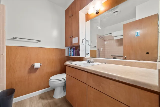 a view of backyard with a garden and trees