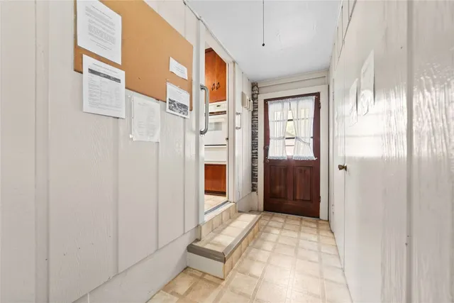 a bathroom with a sink a mirror and a shower