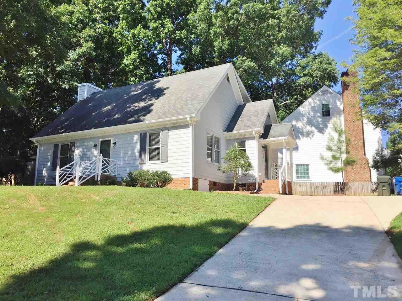 608 Maylands Avenue Raleigh, NC 27615 - Photo 2 of 14 a front view of a house with a yard