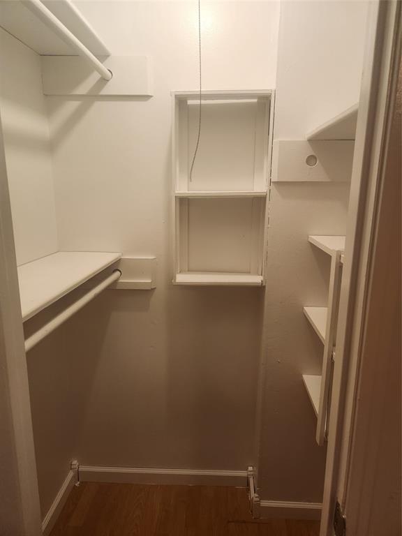 12911 Mitchwin Road Farmers Branch, TX 75234 - Photo 33 of 38 Spacious closet featuring wood finished floors