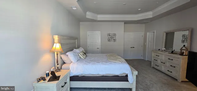 a bathroom with a shower and a sink