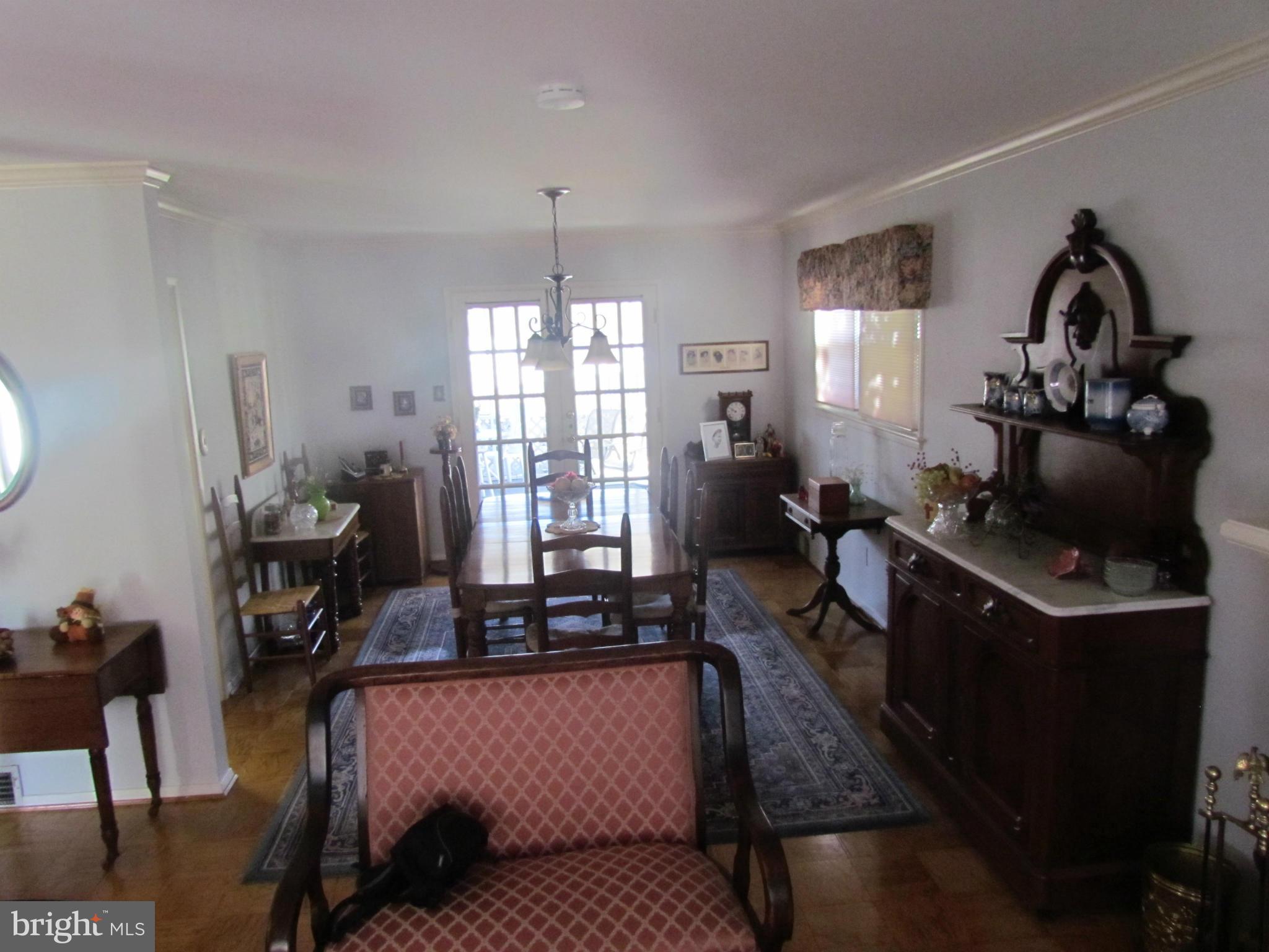 5208 Columbia Road Springfield, VA 22151 - Photo 5 of 22 Dining Room leading to back screened-in Porch